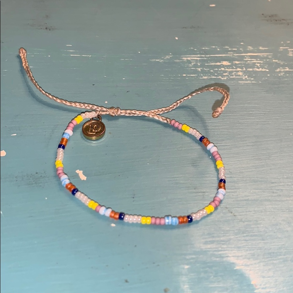 pura vida seed bead w jewelry bag